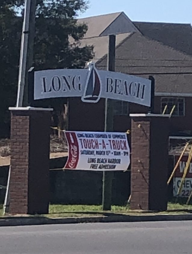 This sign posted at the intersection of Pineville Road and Railroad Street is just one of many signs that are part of the Gateway Project.