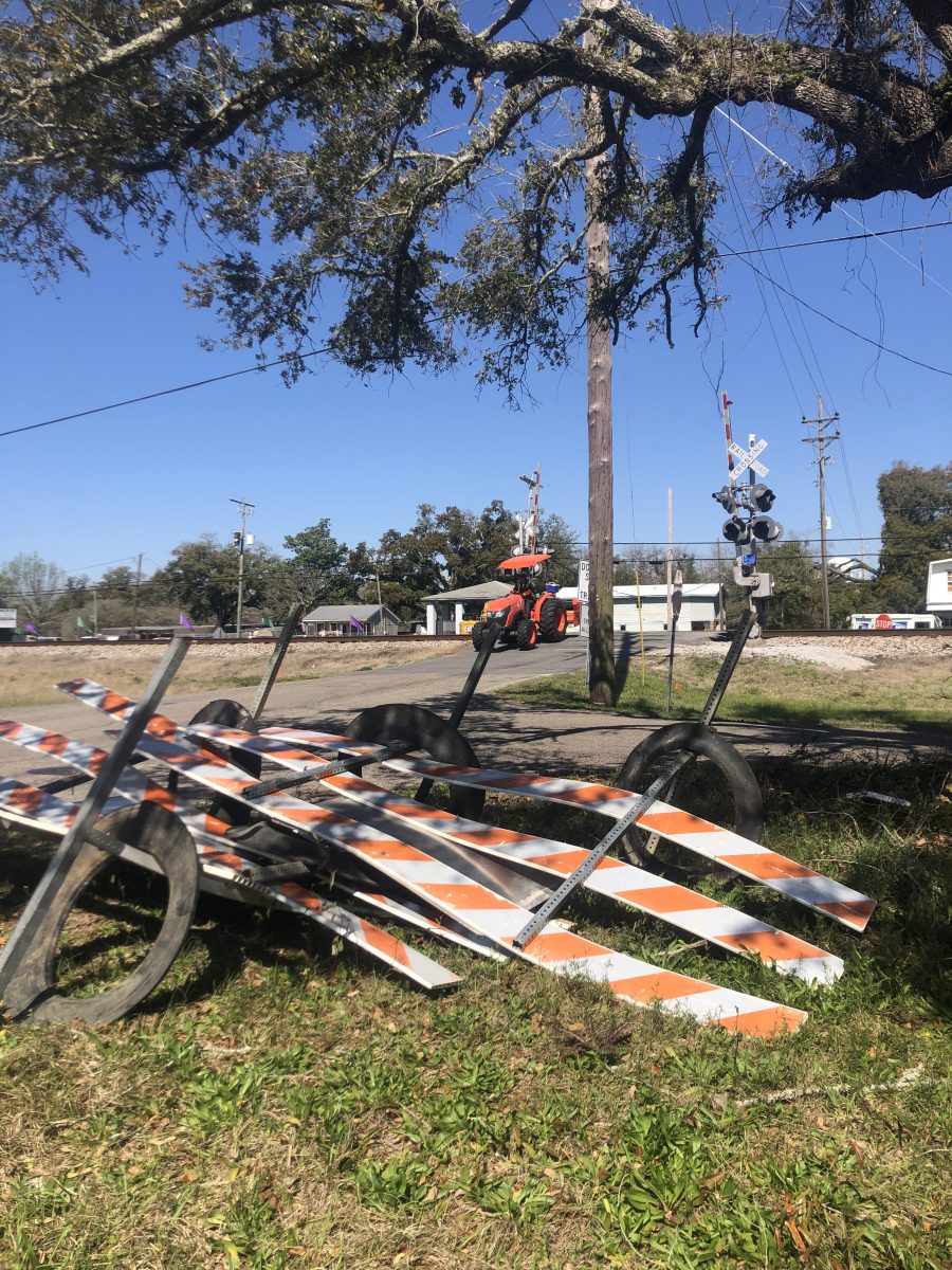 Road closure signs have been set aside at the Nicholson Avenue railroad crossing. Improvements were scheduled to get underway at the crossing on March 3, but have been delayed for about a month. (Photo credit: Toni Miles)