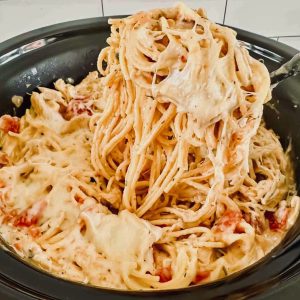 Why spend time standing over a hot stove making and then baking chicken spaghetti when you can let your trusty Crockpot do the hard work? Just fix it and forget it, then enjoy a delicious dish of cheesy, spicy Crockpot Chicken Spaghetti.