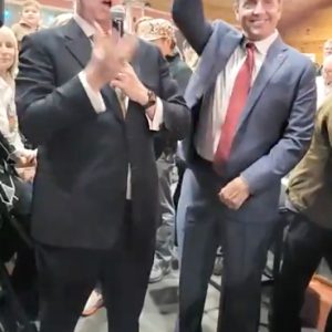 Tim Pierce (right), mayor-elect for Long Beach, pumps his fist in victory upon hearing the results of the April 1 Republican primary election. With no opposition in the General Election on June 1, Pierce will take over as mayor on July 1, replacing two-term Mayor George Bass who announced last year he would not be seeking re-election.