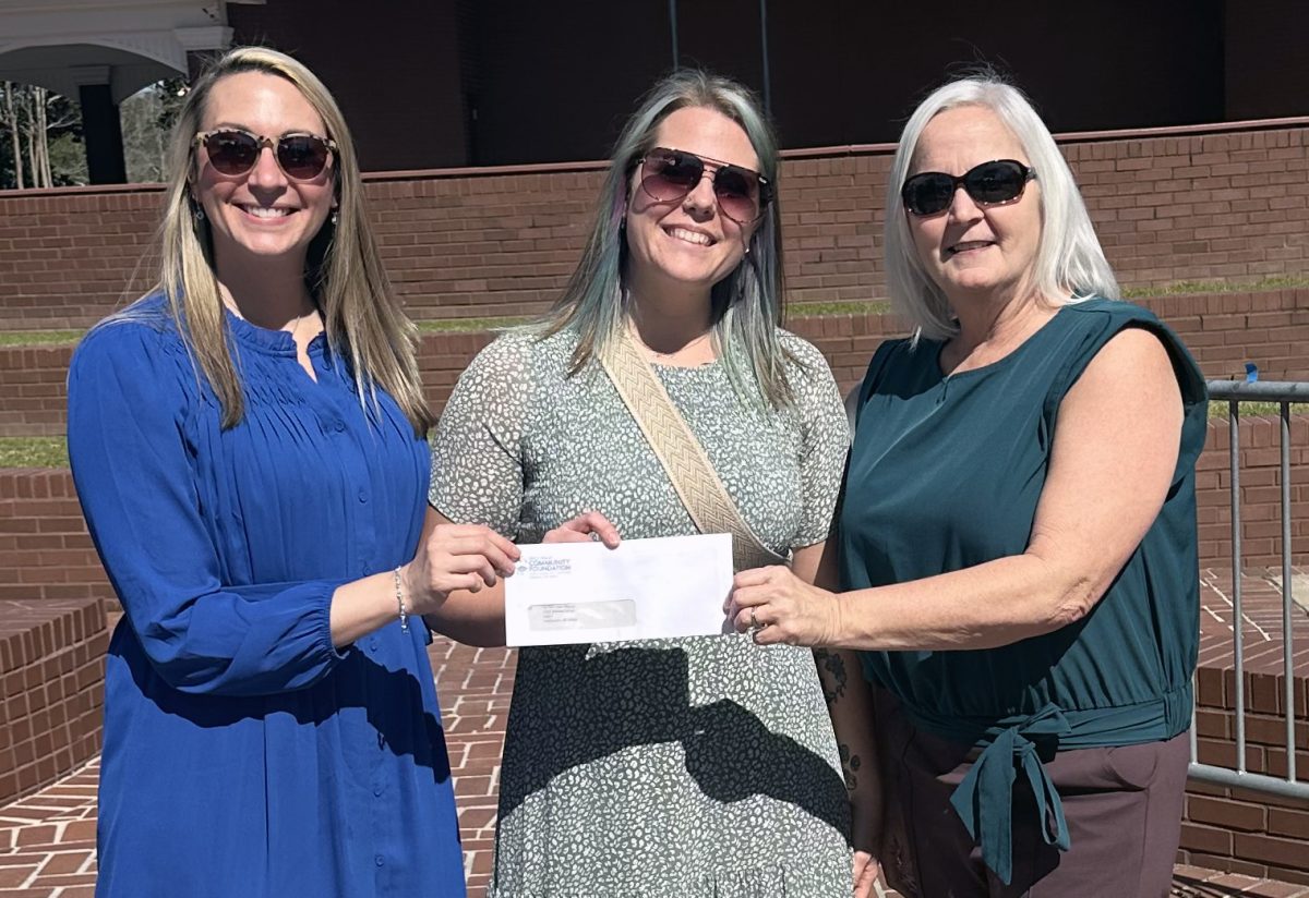 Pictured (l to r) are Dr. Christen Duhé, president and executive director of GCCF; Jessica Rasmussen, lead animal care attendant at For Pet’s Sake Rescue in Long Beach; and Lisa Birmingham, director of Grants and Scholarships at GCCF.
