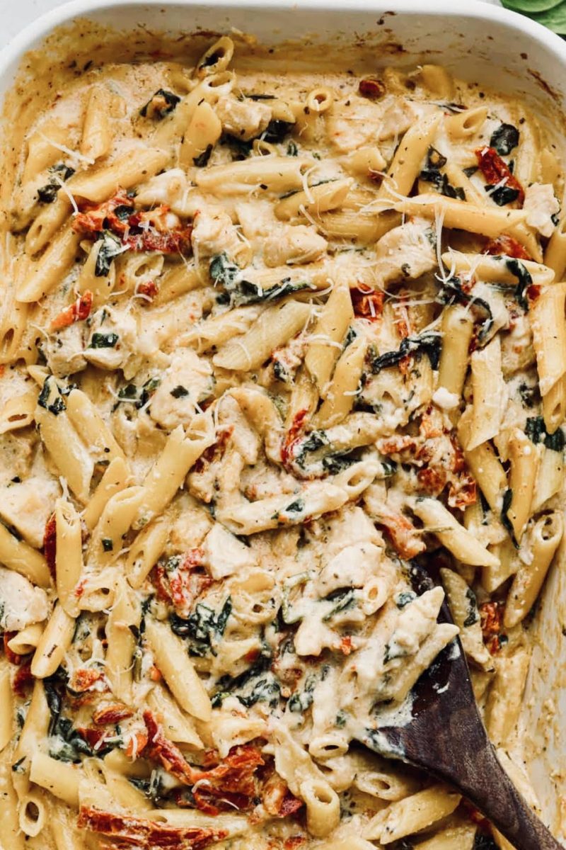 This delicious, easy-to-make dish filled with chicken, pasta, tomatoes, spinach and cheese is the perfect make-ahead dish to throw in the cooler and take to the beach for reheating for a quick meal.