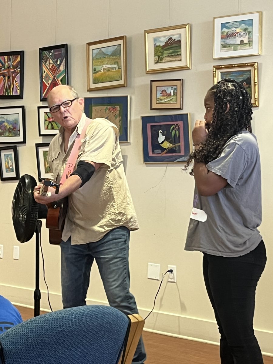 Student playing harmonica during workshop. (Photo Credit: Special to The Pass Post)