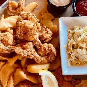 Smoked corn tartar sauce and tangy cocktail sauce, pictured top right, nearly stole the thunder from the delicious fried shrimp served at The Fish House in Pensacola, FL.