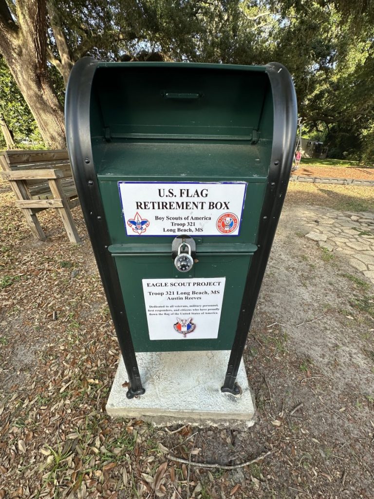 The Boy Scouts of America Troop 321 in Long Beach has set up a U.S. Flag Retirement Box at the park, so people can drop off old and tattered American flags for proper disposal. (Photo credit: Toni Miles)