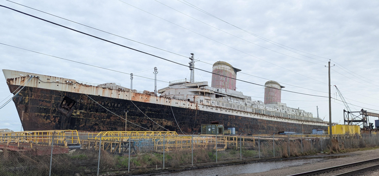 The SS United States is now dry docked in Mobile, Alabama. The once-stately ship will be disassembled and find its final resting place in the water, as the world’s largest artificial reef off the coast of Florida. (Photo credit: Special to Long Beach Breeze)