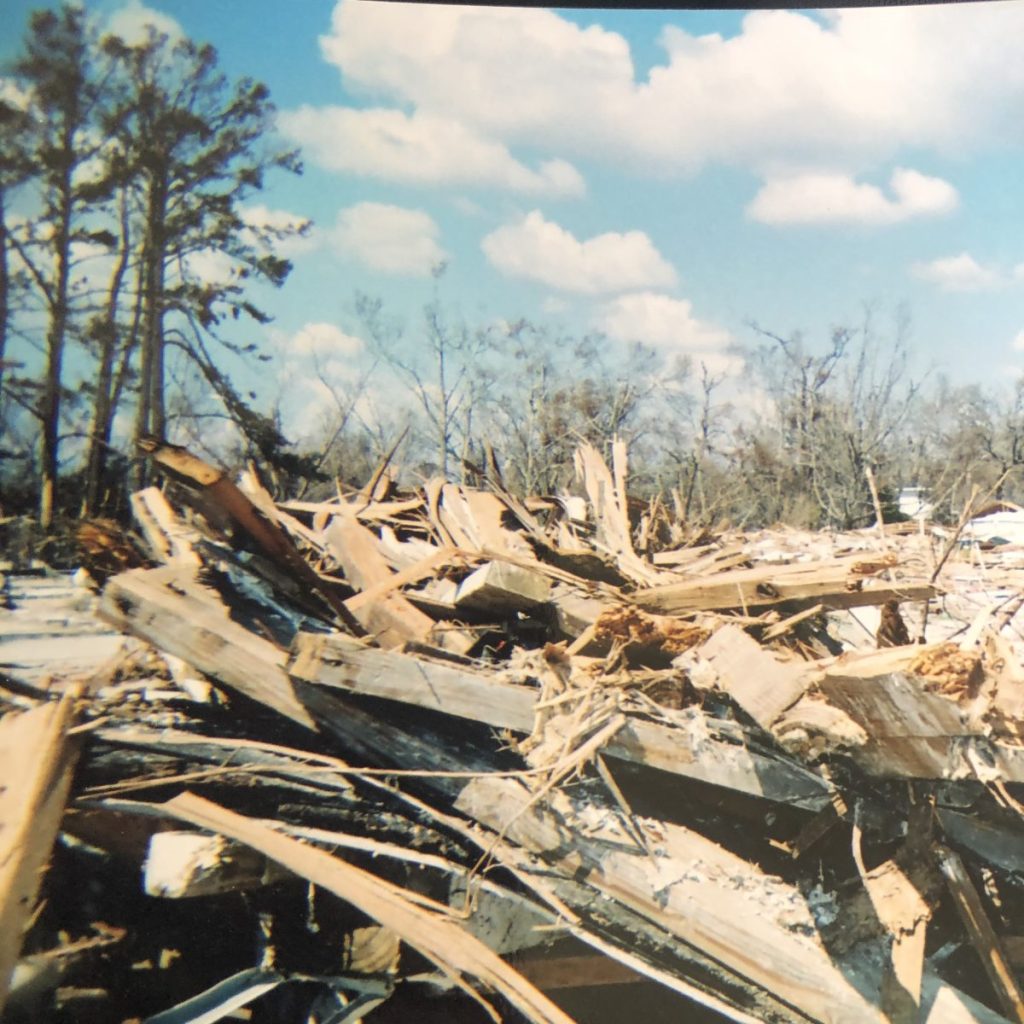 This photo, showing what soon became a commonplace scene throughout the area, was taken in Long Beach the day after Hurricane Katrina ravaged the Mississippi Gulf Coast. (Photo credit: Toni Miles)