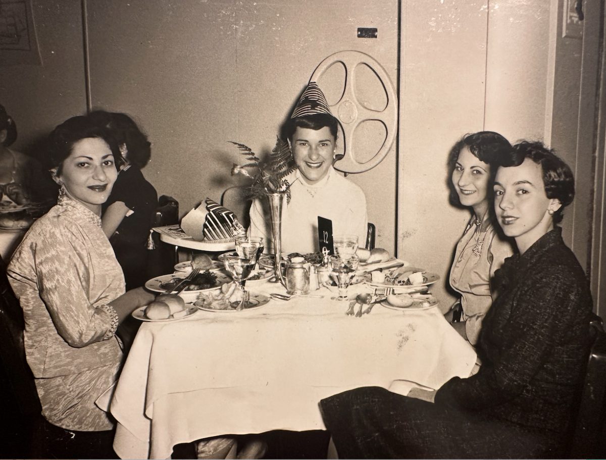 Norma Weeds (left) at the Captain’s Supper held in the dining area of the SS United States right before the ship made it to its trans-Atlantic destination in Europe back in 1954. (Photo credit: Special to Long Beach Breeze)