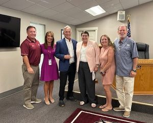 Pictured (l to r) are Long Beach School District School Board Secretary Scott Rishel, Superintendent Dr. Talia Lock, Glenn Mueller, Long Beach Excellence in Education Foundation Board member Carrolyn Hamilton and School Board members Lisa Smith and Frank Castiglia.