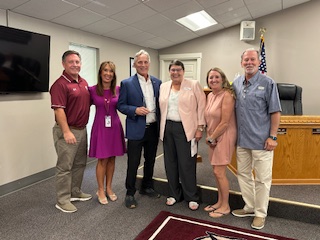 Pictured (l to r) are Long Beach School District School Board Secretary Scott Rishel, Superintendent Dr. Talia Lock, Glenn Mueller, Long Beach Excellence in Education Foundation Board member Carrolyn Hamilton and School Board members Lisa Smith and Frank Castiglia.
