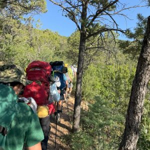 Troop 321 is pictured backpacking at Scouting America’s premier high adventure camp, Philmont Scout Reservation.