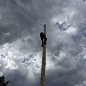 Eagle Scout Chase Cockrell winning the Spar Pole Climb Competition. During the trek at Philmont, scouts participate at activities at the camps under the tutelage of experienced trainers.