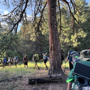 Troop 321 getting an early start on the trail just after sunrise at Philmont Scout Reservation.