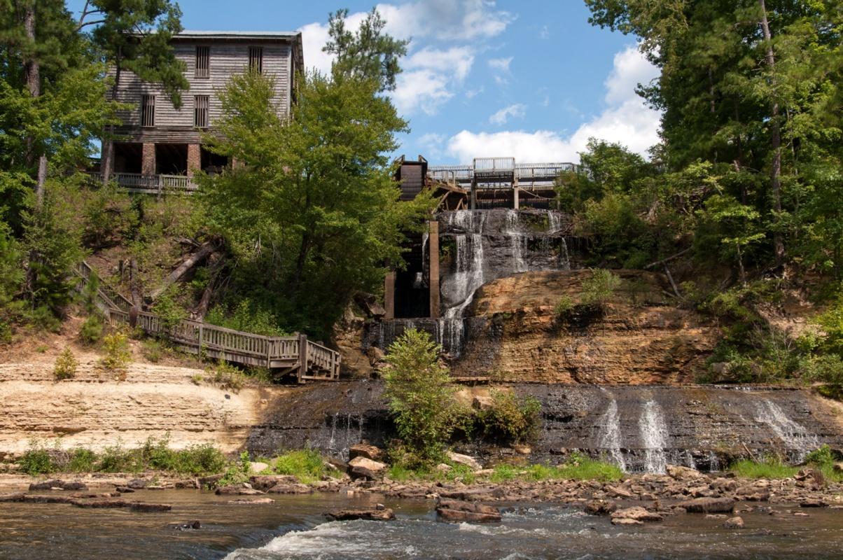 Dunn's Falls Water Park in Enterprise, MS, is one of the most scenic (and coolest!) places to visit during the summer. 