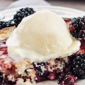 Nothing's better in the summertime than a scoop of homemade ice cream on top of hot blackberry cobbler fresh from the oven.