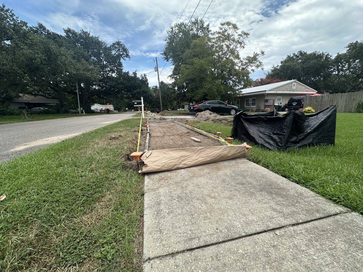 : In addition to connecting gaps, the work includes constructing new sidewalks where none existed. (Photo credit Toni Miles)