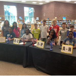 Pictured Above: Mrs. Charlene Stephens and her 6th Grade World History students helping to set up and work the mock election at Pass Christian Middle School.