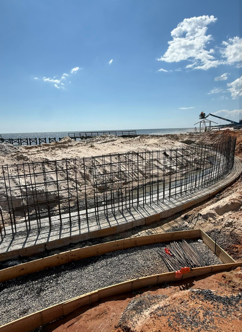 Progress continues on the City of Long Beach’s Gateway Project. As of this photo, the contractor has poured the first footing for sidewalk curbs along the beachfront as the structure is beginning to take shape.