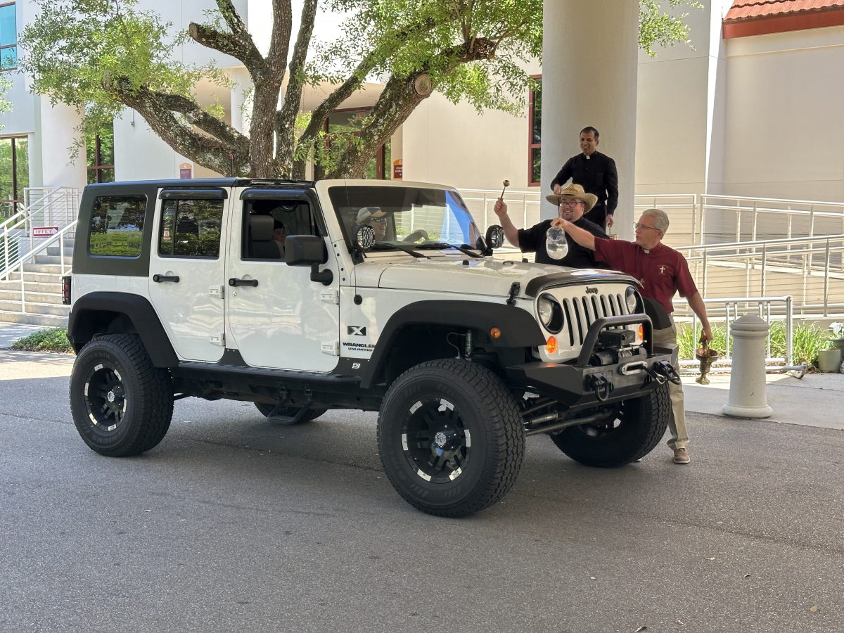 : A Jeep rolls through to receive a blessing at last year’s Blessing of the Jeeps event. This year’s event is set to take place at St. Thomas the Apostle Catholic Church on Saturday, April 11.