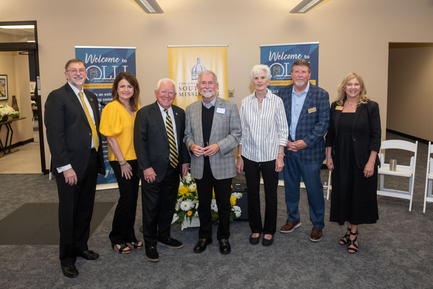 Pictured (l to r) at the grand opening of the OLLI Learning Center in Long Beach are Dr. Lance Nail, Southern Miss provost and senior vice president for academic affairs; Allyson Easterwood, Southern Miss vice president for finance and administration; Dr. Joseph Paul, Southern Miss president; Steve Thaxton, executive director of the OLLI National Resource Center at Northwestern University; Carol Ann Lewando, OLLI founding member; Dr. Jeff Hinton, associate provost for Gulf Coast and lifelong learning success; and Paula Mathis, Southern Miss OLLI director. The new space is expected to allow for expansion of lifelong learning opportunities for adults in the community, bringing more classes, workshops and connections to Long Beach.
