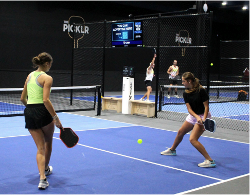 Sisters and Pass High students Adalynn and Olivia Snell play in the beginners mixed bracket. Adalyn alsoplayed intermediate mixed doubles with her uncle, as well, medaling 2nd in that bracket. 