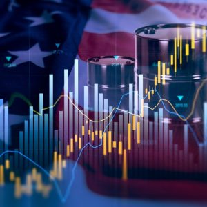 A stock graph that's moving up and down. There is an American flag, a $100 bill, and some drums of oil in the background.