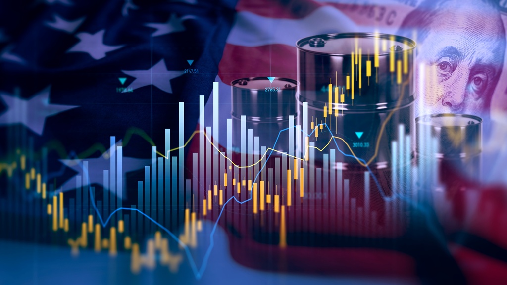 A stock graph that's moving up and down. There is an American flag, a $100 bill, and some drums of oil in the background.