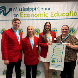 S t u d e n t s J a ylin B r y a n, Av aly n B r y a n, P aig e L a d n e r, a n d t e a c h e r J e n nif e r F r y e r e p r e s e n tin g P C H S a t t h e S t a t e Fin a n c e C h a m pio n s hip