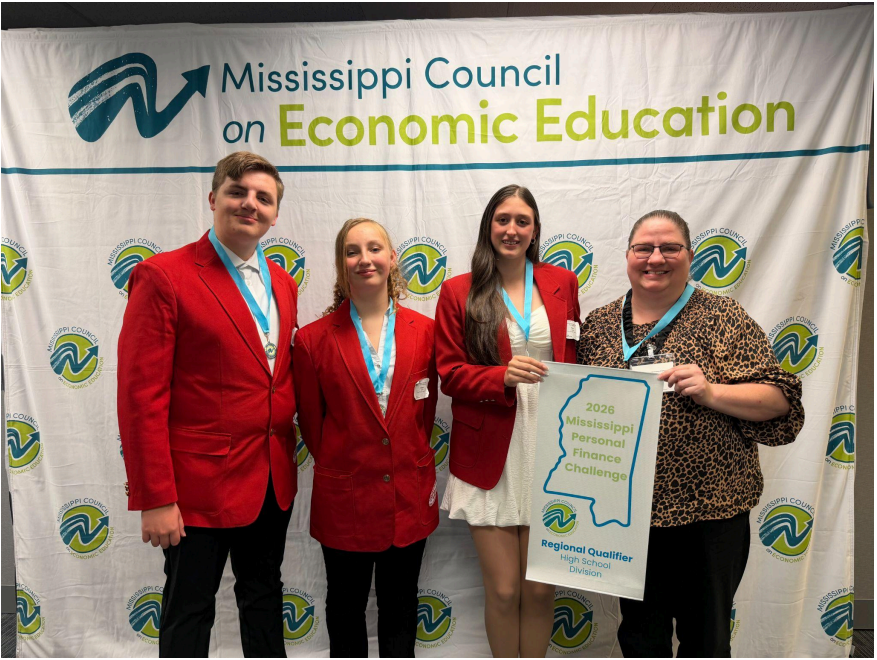 St u d e n t s J a ylin B r y a n, Av aly n B r y a n, P aig e L a d n e r, a n d t e a c h e r J e n nif e r F r y e r e p r e s e n tin g P C H S a t t h e S t a t e Fin a n c e C h a m pio n s hip