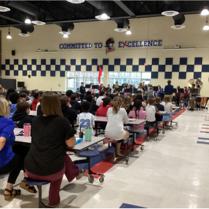 Member of the PCMS band performing for the soon-to-be middle school students