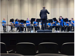 Pictured Above: Member of the PCMS advanced band performing at Biloxi High School in the prestigious Gulf Coast Band Directors Association Concert Festival.