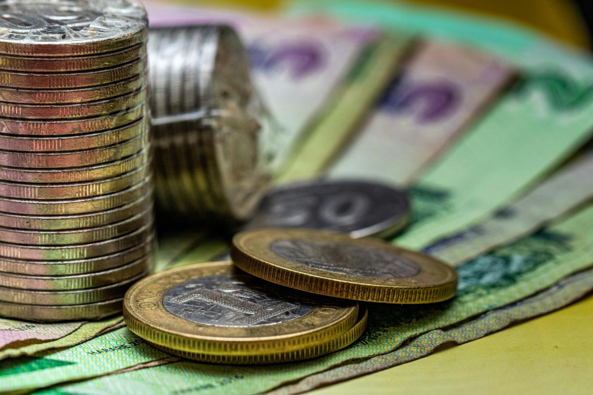 close up shot of coins and bills
