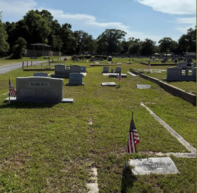 Members of the Donnie Levens American Legion Post 1995 and the Eddy Blake VFW Post 3937 placed American flags on the headstones of veterans buried in Long Beach cemeteries for Memorial Day.