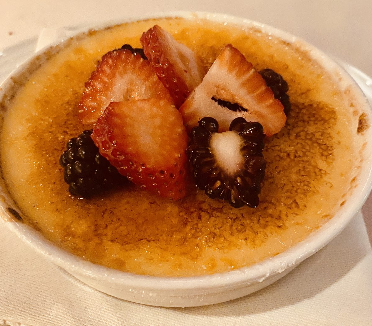A decadent dessert of crème brulee topped by berries was the perfect ending to an amazing dinner at BR Prime Steakhouse. (Photo by Kara Kimbrough)