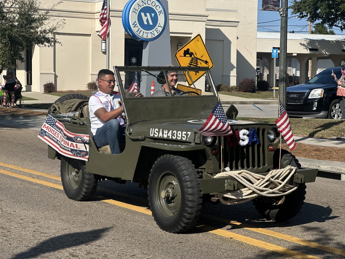 : Mosies Espinal served as Parade Marshal (as seen here) at last year’s Veterans Day parade in Long Beach. Espinal addressed Long Beach City leaders about plans to combine the annual veterans parade into one event for the cities of Long Beach and Pass Christian. The parade is a joint collaboration between the Gulf Coast Veterans Association and the Coast Cares local non-profit group. (Photo credit: Toni Miles)