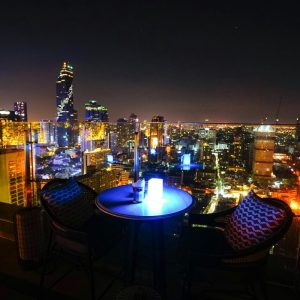 balcony overlooking city lights at night