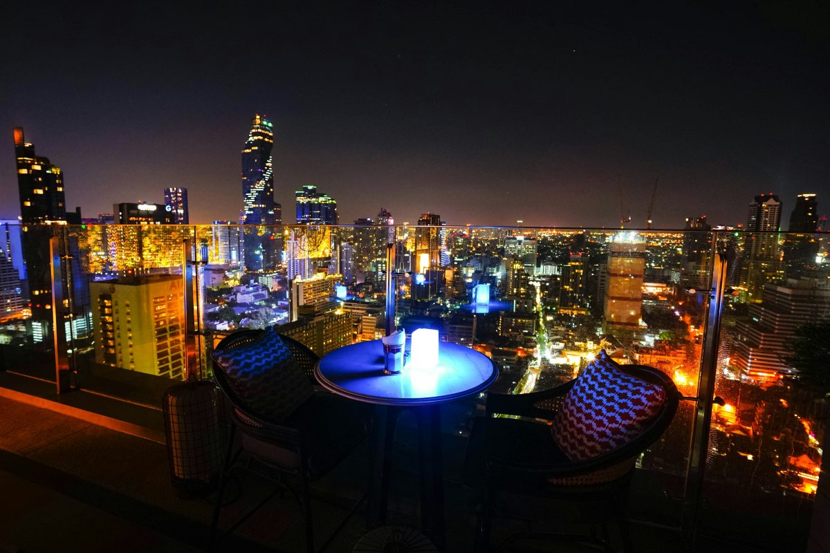 balcony overlooking city lights at night