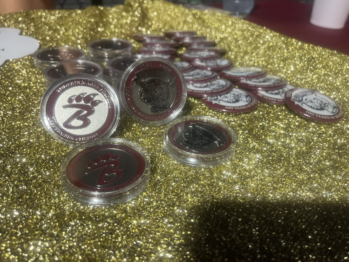 One-hundred-year commemorative coins were available to mark the occasion. (Photo credit Toni Miles