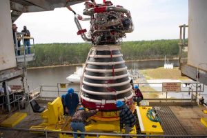 Teams at NASA's Stennis Space Center deliver, lift, and install the first new production on RS-25 engine on the Fred Haise Test Stand on February 18, 2025 (NASA/ Danny Nowlin)